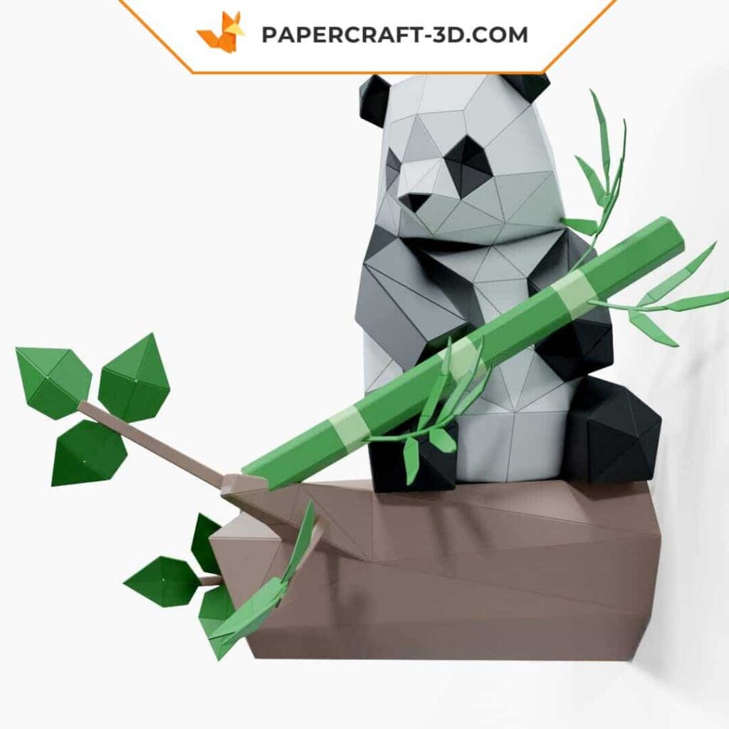 Papercraft panda sentado no bambu em origami
