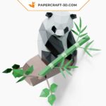 Papercraft panda sitting on bamboo in 3D origami
