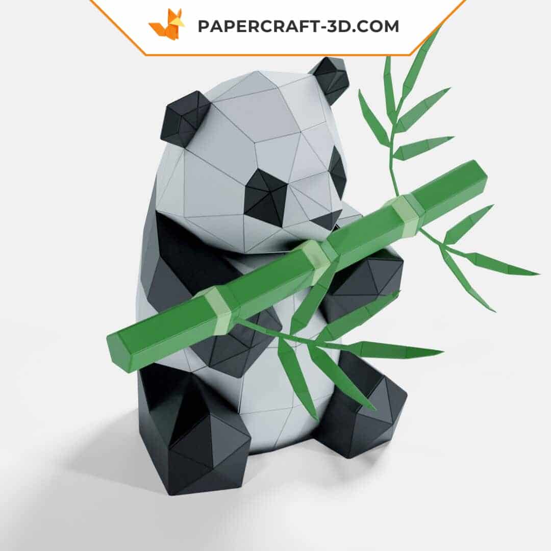 Papercraft panda eating bamboo in origami