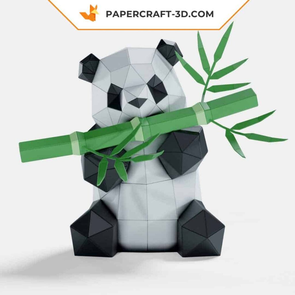 Papercraft panda comendo bambu em origami
