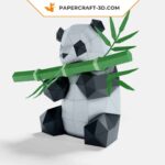 Papercraft panda mangeant du bambou en origami