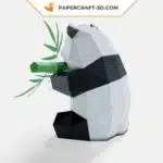 Papercraft panda mangeant du bambou en origami