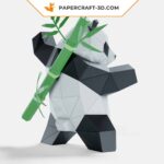 Papercraft panda practicing martial arts in 3D origami