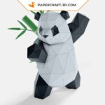 Papercraft panda practicing martial arts in 3D origami