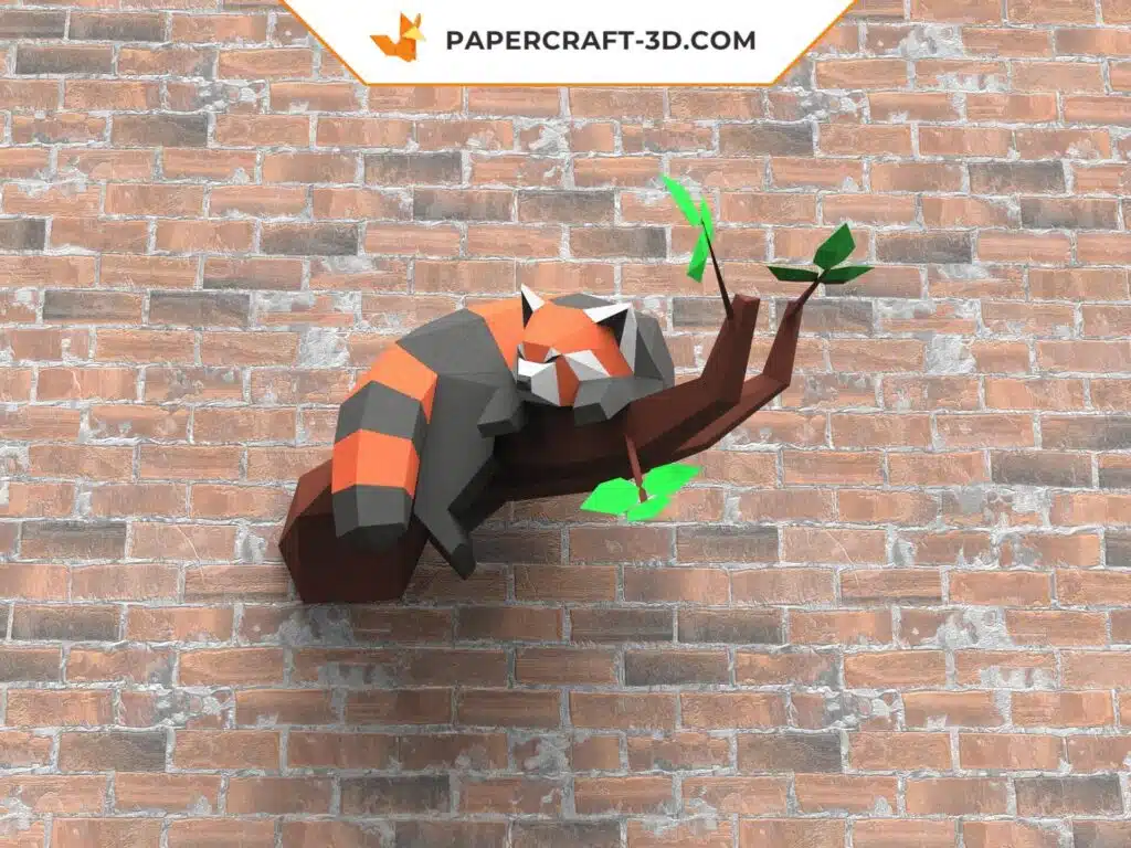 Papercraft panda rosso addormentato su un ramo in origami 3D, dettaglio