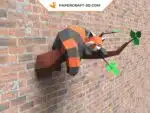 Papercraft panda rosso addormentato su un ramo in origami 3D, vista laterale