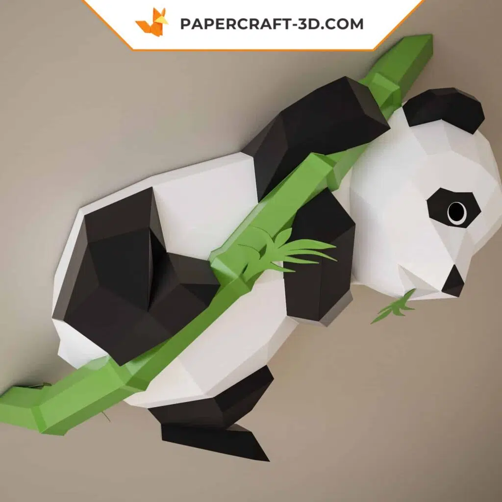 Papercraft panda on bamboo in 3D origami