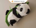 Papercraft panda on bamboo in 3D origami