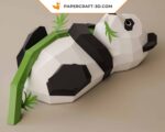 Papercraft panda on bamboo in 3D origami