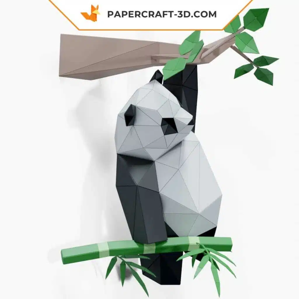 Papercraft de panda subindo no galho em origami 3D
