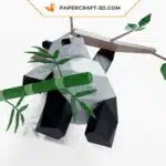 Papercraft de panda subindo no galho em origami 3D