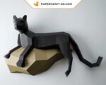 Papercraft black panther on a rock in 3D origami