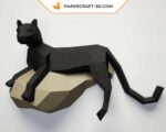 Papercraft black panther on a rock in 3D origami