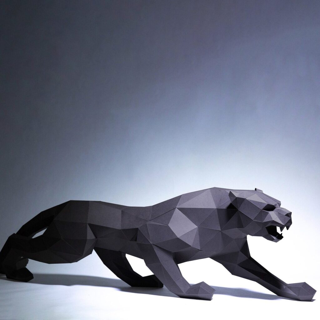 Papercraft sitting lion in 3D origami