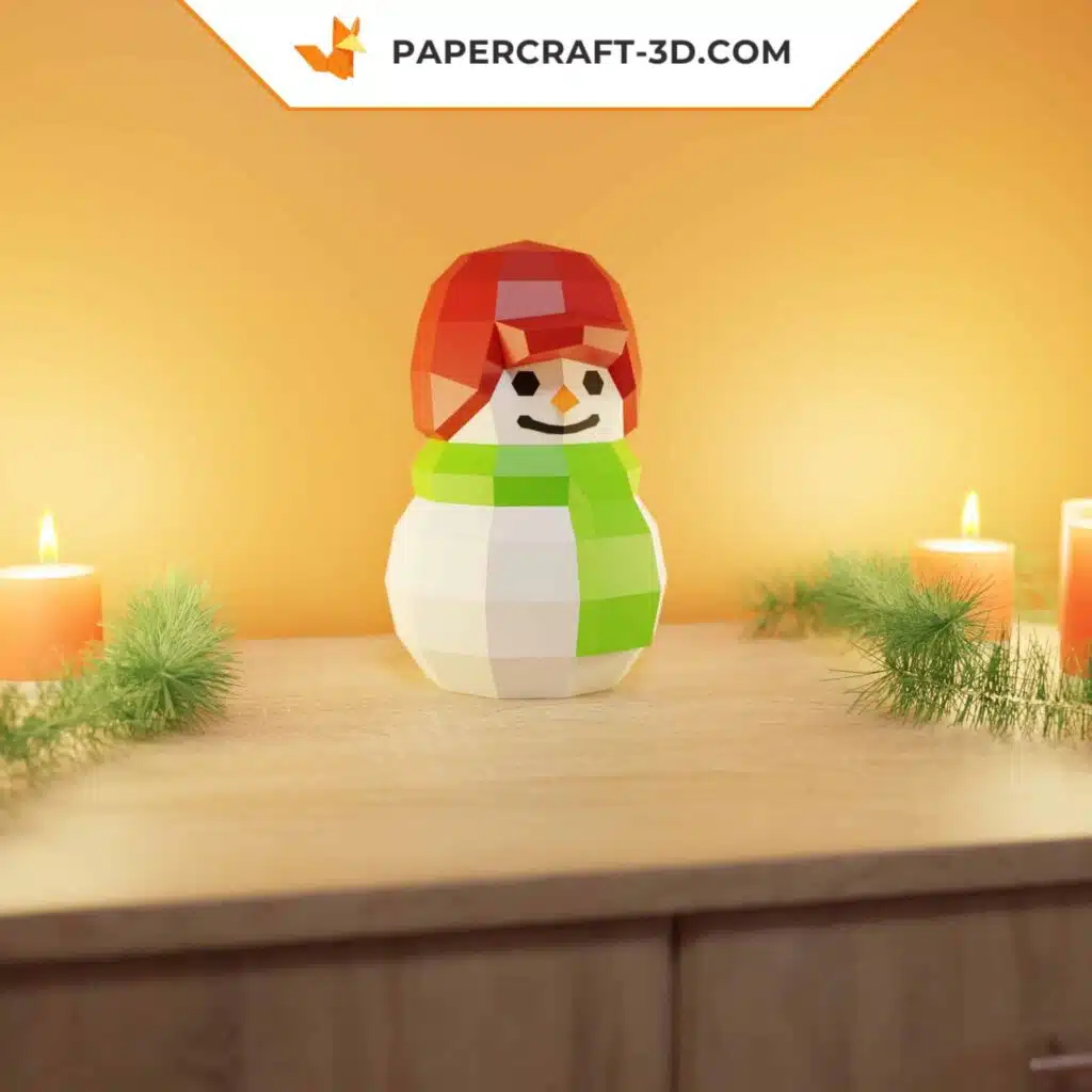 Papercraft bonhomme de neige au bonnet rouge en origami 3D