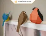 Papercraft de pequenos pássaros em origami 3D
