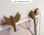 Papercraft de pequenos pássaros em origami 3D