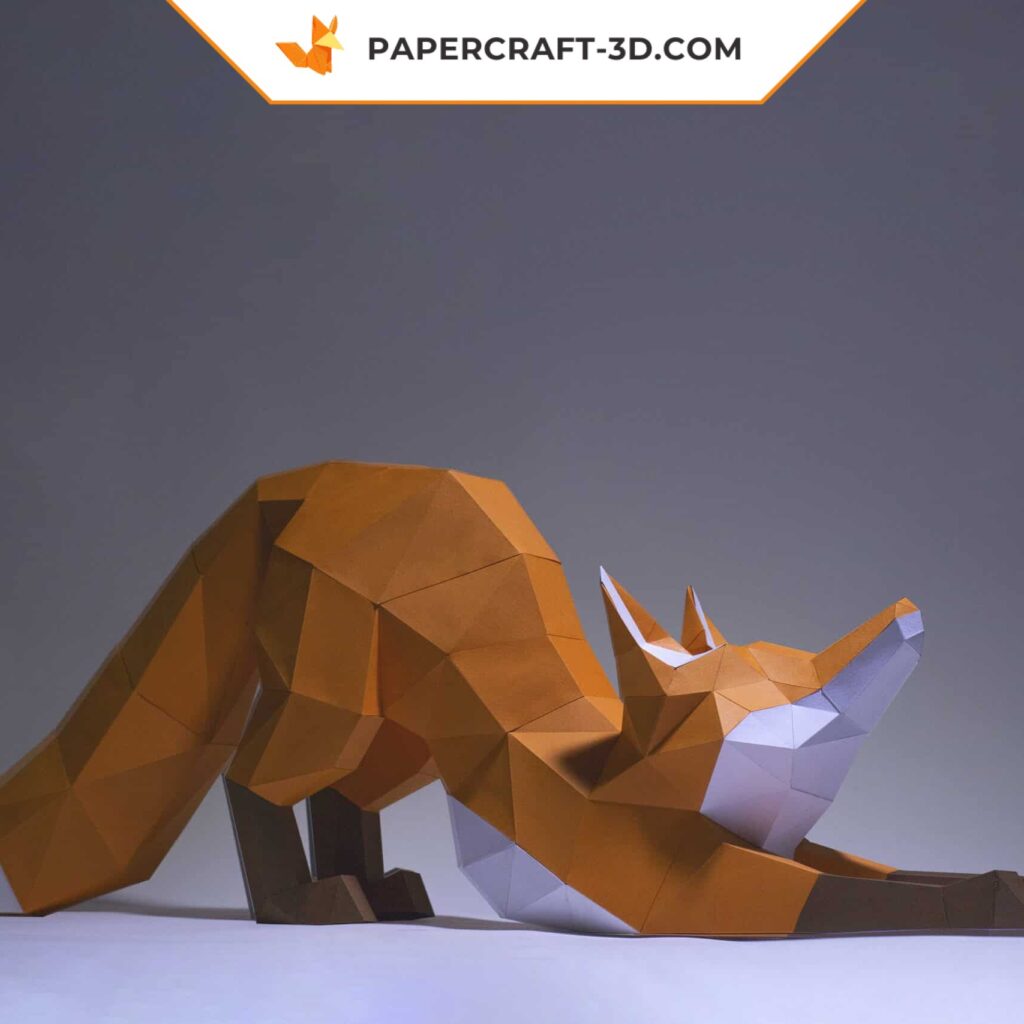 Papercraft fox stretching in 3D origami