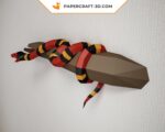 Papercraft of scarlet royal snake on branch