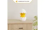 Papercraft pintinho em um ovo em origami 3D
