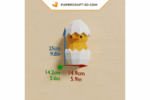 Papercraft poussin dans un œuf en origami 3D