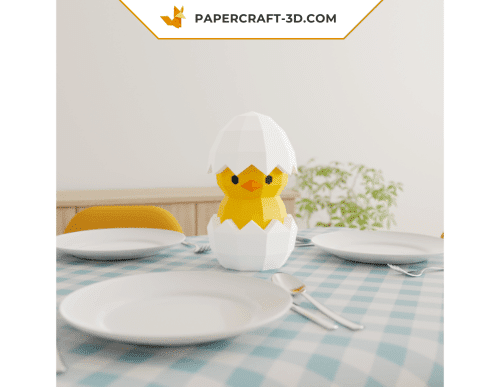 Papercraft chick in an egg in 3D origami