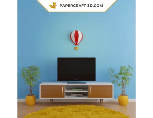 Papercraft panda sitting on bamboo in 3D origami