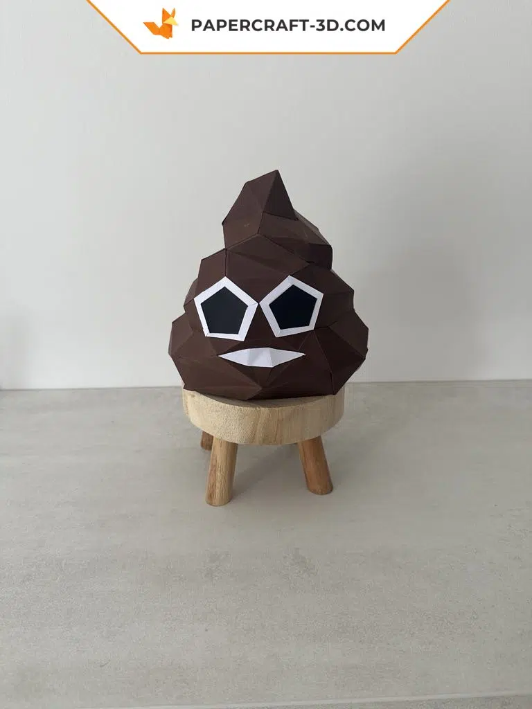Papercraft de cocô divertido em origami 3D, vista lateral