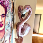 Papercraft flamingo heads in love in 3D origami