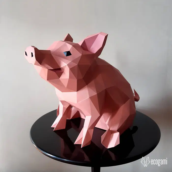 Papercraft di maiale seduto in origami 3D