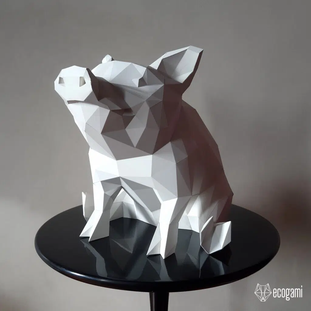 Papercraft di maiale seduto in origami 3D