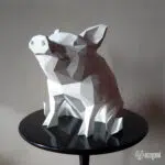 Papercraft di maiale seduto in origami 3D