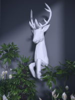 Papercraft deer emerging from wall in 3D origami
