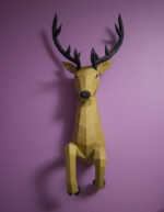 Papercraft deer emerging from wall in 3D origami