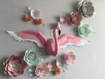 Papercraft flamingo wall with wings in 3D origami