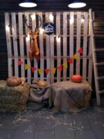 Papercraft deer emerging from wall in 3D origami