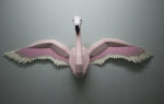 Papercraft flamingo wall with wings in 3D origami