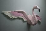 Papercraft flamingo wall with wings in 3D origami