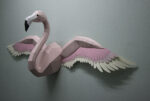 Papercraft flamingo wall with wings in 3D origami