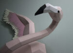Papercraft flamingo wall with wings in 3D origami