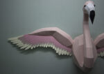 Papercraft flamingo wall with wings in 3D origami