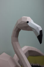 Papercraft flamingo wall with wings in 3D origami