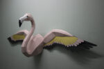 Papercraft flamingo wall with wings in 3D origami