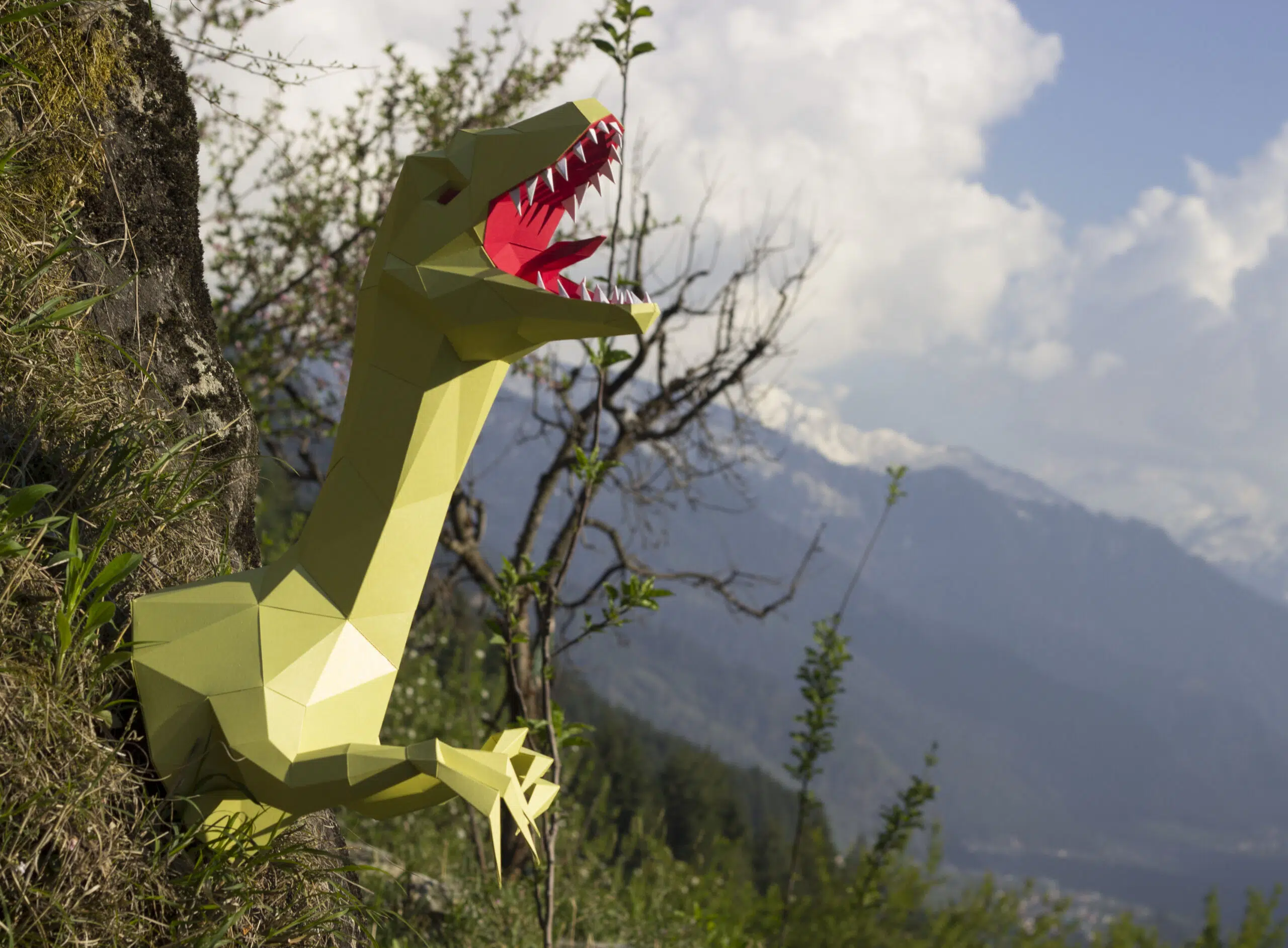 Papercraft cabeza de raptor Jurassic Park en origami, vista lateral