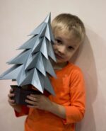 Papercraft Christmas tree in a pot in 3D origami