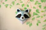 Papercraft de cabeça de guaxinim em origami 3D
