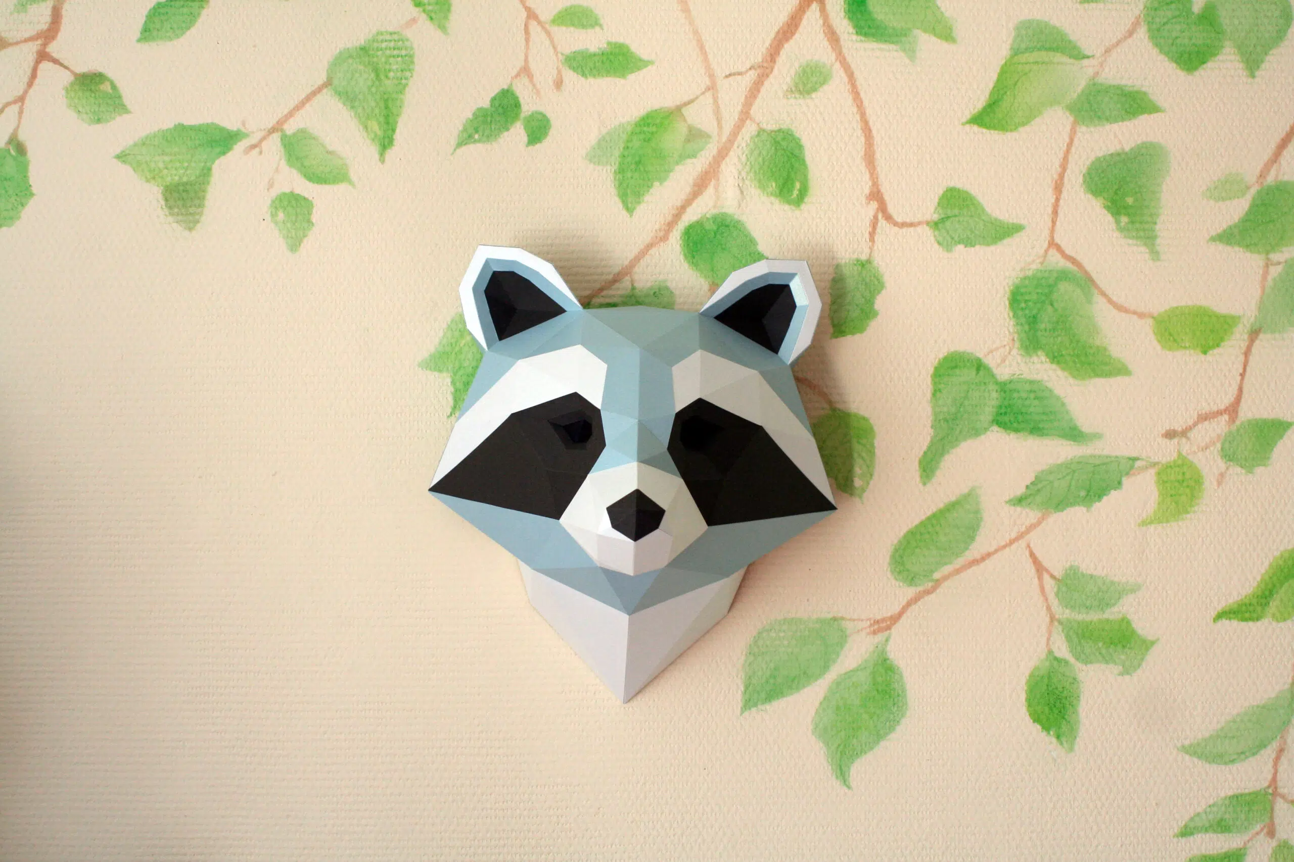Papercraft de cabeça de guaxinim em origami 3D, vista lateral