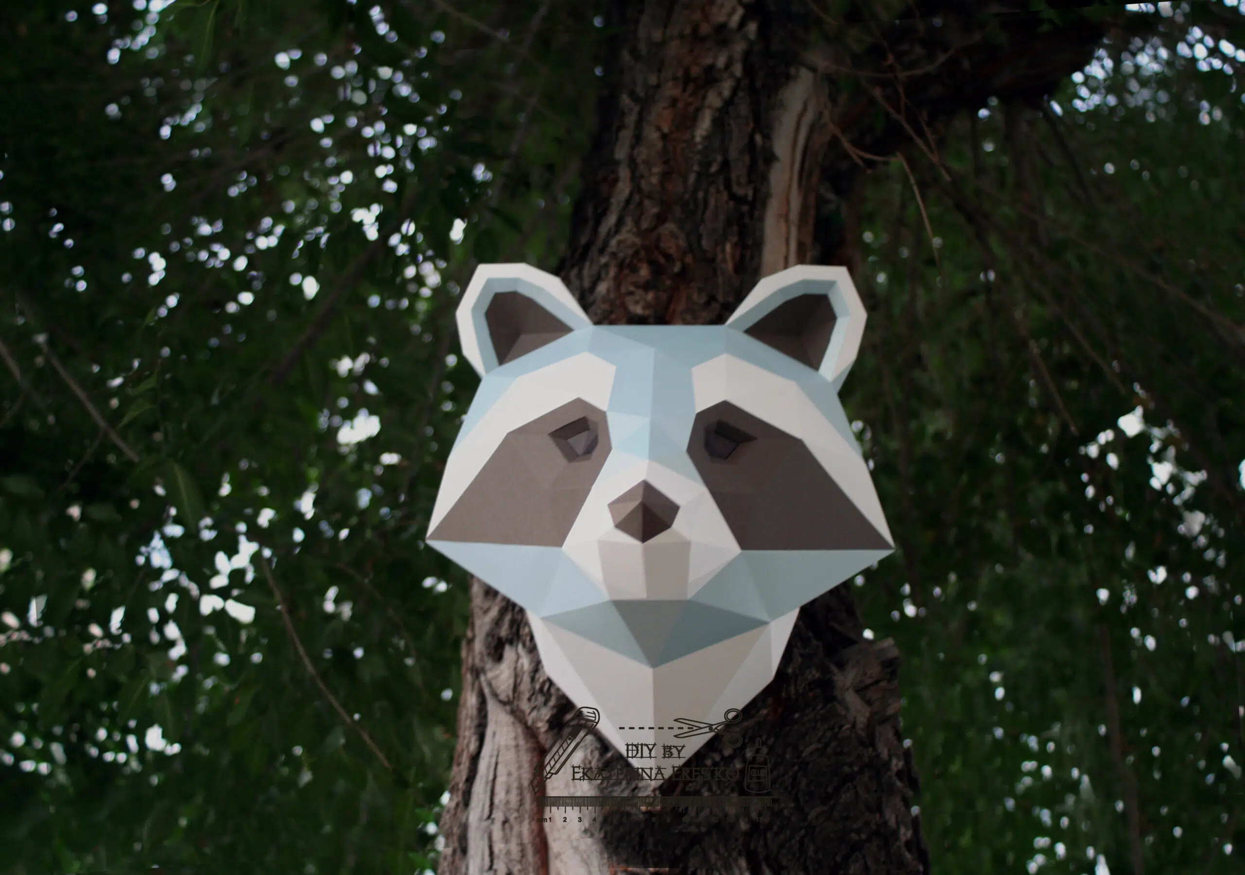 Papercraft de cabeça de guaxinim em origami 3D, vista 2