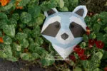 Papercraft de cabeça de guaxinim em origami 3D
