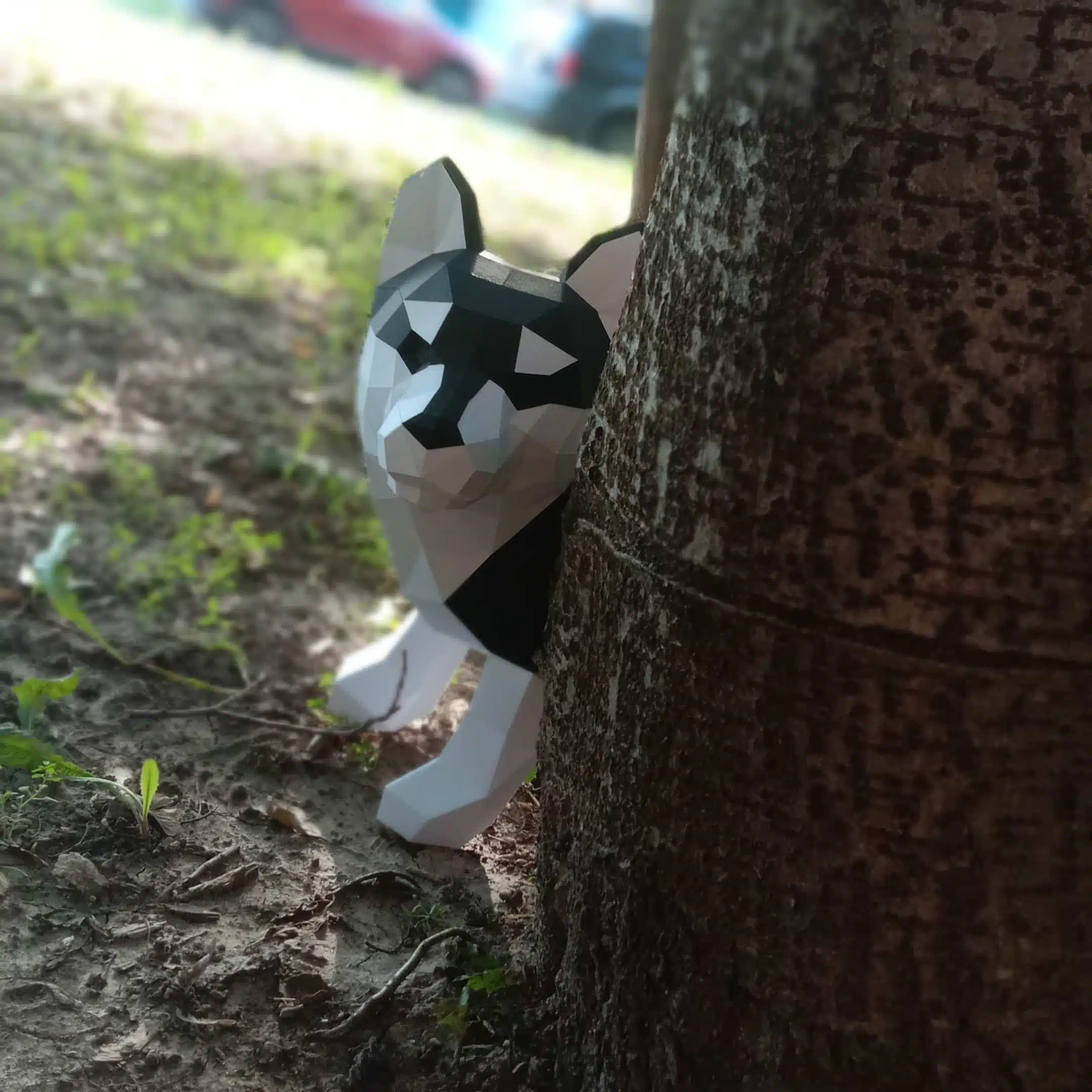 Papercraft de filhote de Husky em origami, vista lateral